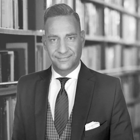 Lenard a lawyer wearing a suit and tie