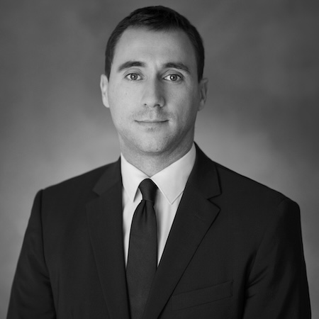 Gábor a lawyer wearing a suit tie